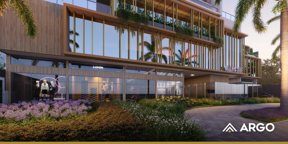 Fachada de empreendimento ARGO com lojas no térreo e paisagismo, integrando moradia e serviços